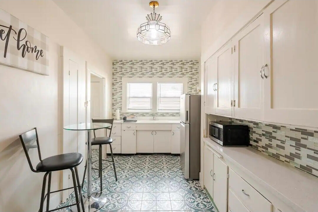 Fully equipped kitchen in furnished Vallejo extended stay rental with modern appliances and ample counter space